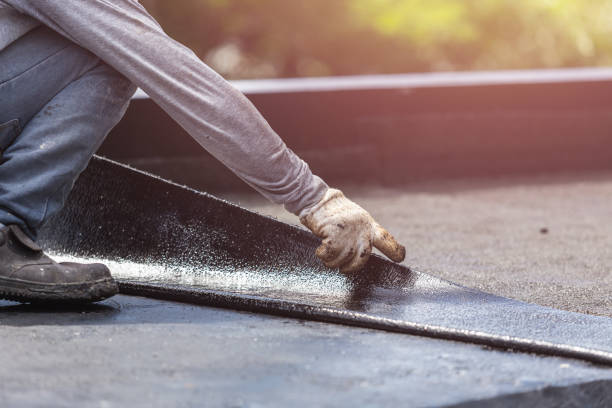 Professional Basement Waterproofing technician working in Iuka, KS
